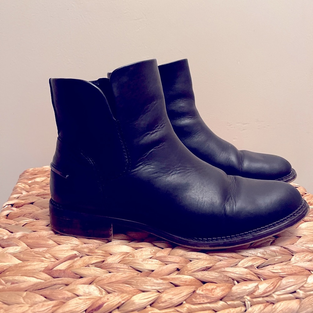 Franco Sarto black leather zip up ankle boots.